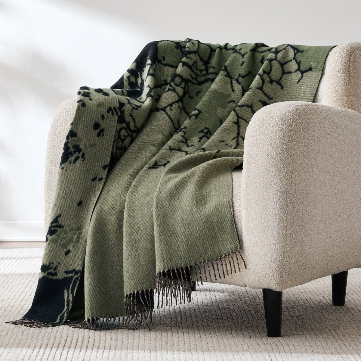 Wool and cashmere throw with a root-inspired pattern